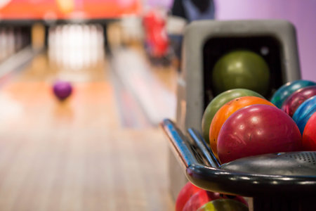 Bowling club with colorful bowling balls and pins. Games and entertainment.