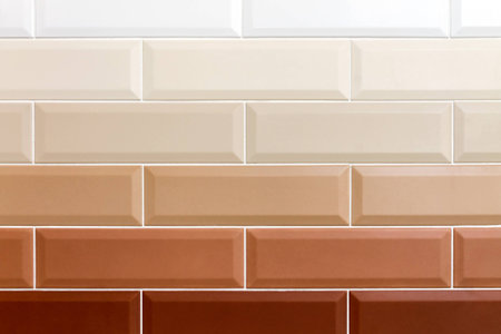Background in the form of bricks. Ceramic brick tiles. Gradient color. Close-up