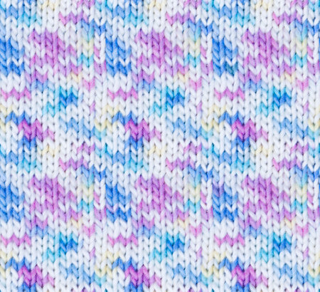 Seamless knitted texture. Melange yarn in pastel shades. Acrylic children's yarn. The front side of...