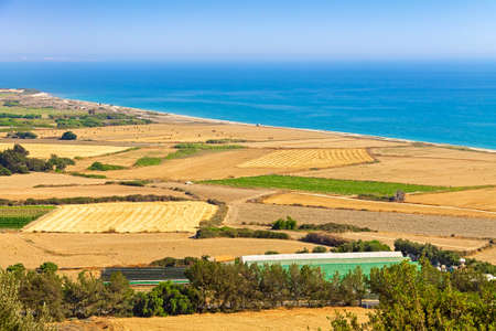 View of the Mediterranean Sea and agricultural fields from the observation deck of the ancient city of Kourion. This place is near Limassol in Cyprus.の写真素材