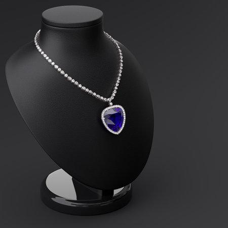 Luxurious necklace of diamonds and blue sapphire in the form of a heart on a leather stand in the form of a bust. Side view Jewelry showcase. 3d rendering.の写真素材