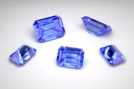 Scattering of blue sapphires of different sizes on the white background. Exhibition of precious stones. Emerald cut. 3d rendering.の写真素材