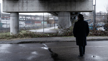 Behind a man standing aloneの写真素材
