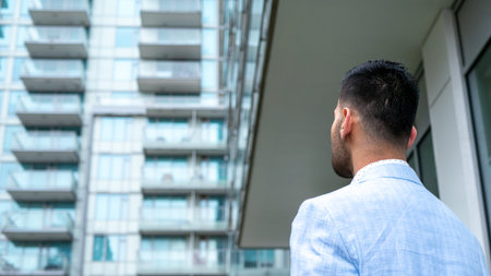 a businessman in a suit who calls with a syriad expression