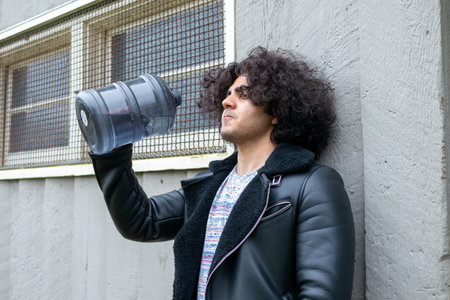 Man drinking water in bottleの写真素材