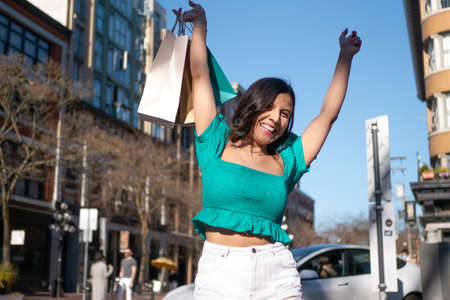Mexican woman enjoying shopping in Vancouverの写真素材