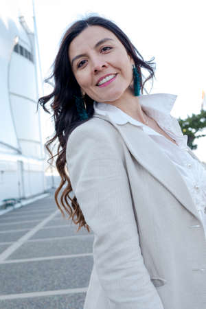 Mexican woman smiles confidently in Vancouver, Canadaの写真素材