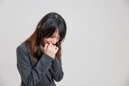 Businesswoman in a crying suitの写真素材