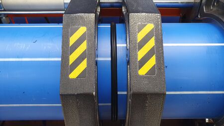 Aarhus, Denmark - 13 feb 2020: Welding machine for welding peh plastic pipes.のeditorial素材