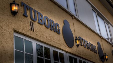 Randers, Denmark - 08 feb 2020: The logo of the Tuborg building in Randers.のeditorial素材