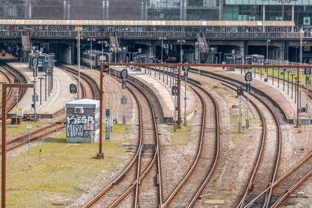 Aarhus, Denmark - 24 march 2020:  Aarhus train station with rails going under bridge. Bruun's...