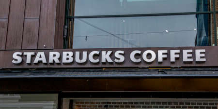 Aarhus, Denmark - 24 March 2020: The logo of the Starbucks Coffee building in Aarhus.のeditorial素材