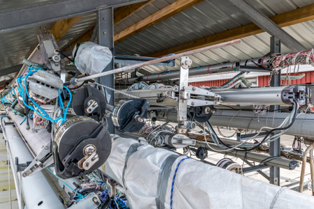 Mariager, Denmark - 29 march 2020: Masts of many sea yachts stored for winter, close-up