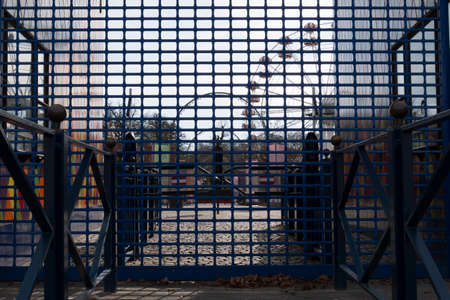 Aarhus, Denmark - March 24, 2020: Tivoli Fiheden in Aarhus is snark ready to open for the season, colorful entrance to the amusement park, rides are seen in the backgroundのeditorial素材