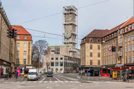 Aarhus, Denmark - 24 march 2020:  Aarhus City Hall in the middle. Hotel Ritz on the right. The Mayor Hotel & Eatery is on the left. traffic lights with cars.のeditorial素材