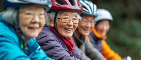 Group of asian elderly women cycling in the park. Selective focus.の素材