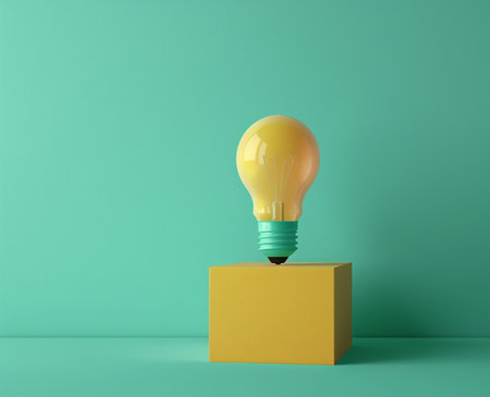 Yellow light bulb on a yellow cube on a green background. 3d renderingの素材