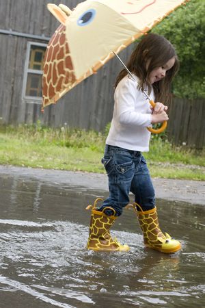 A fun day with a 4-year-old and adorable rain accessories. の写真素材