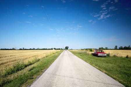 Deserted road with blue sky