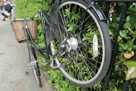 Bicycle hung in front of the house in Portobello Areaの写真素材