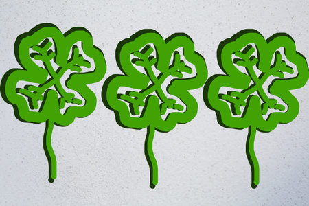 Three green quatrefoils with shadow.の写真素材