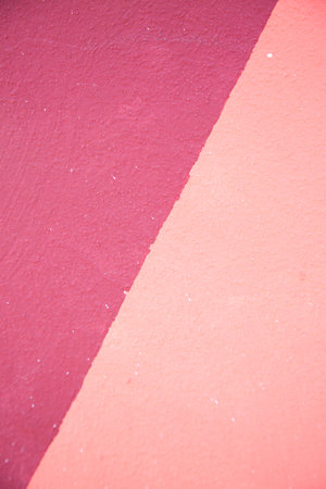 This image shows a closeup view of a vibrant pink and purple striped surfaceの写真素材