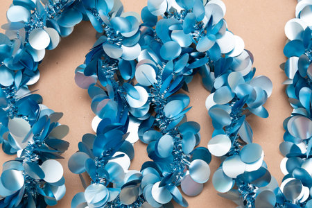 A detailed close up view of a stunning blue and white sequined necklaceの写真素材