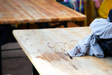 There is a wooden table adorned with the word inscribed on it