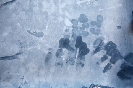 A detailed close up of an individual s footprints in the snowの写真素材