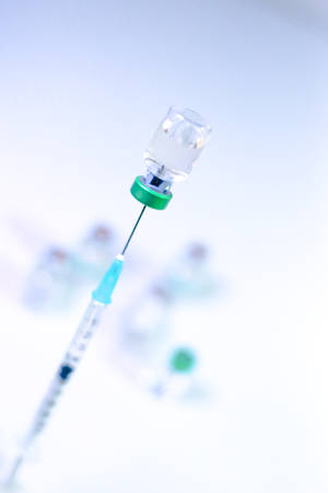 Vaccine needleâ syringeâ hypodermicâ injection single dose for preventionâ immune treatmentâ illnessâ virusâ diseaseâ in babyâ childâ and adult.concept antibioticâ drug insullin.selective focusの写真素材