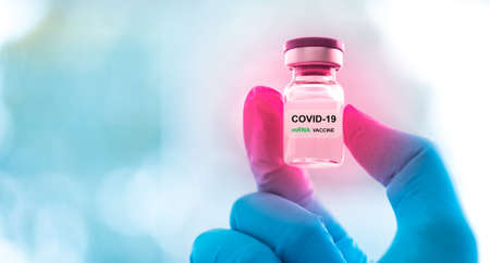 Vaccine vial dose flu shot drug needle syringe,medical concept vaccination hypodermic injection treatment disease care hospital prevention immunization illness disease  baby child.blue backgroundの写真素材