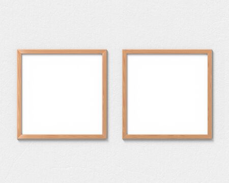 Set of 2 square wooden frames mockup hanging on the wall. Empty base for picture or text. 3D rendering.の写真素材