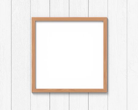 Square wooden frames mockup hanging on the wall. Empty base for picture or text. 3D rendering.の写真素材