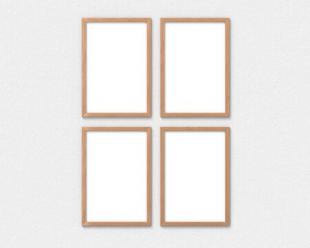 Set of 4 vertical wooden frames mockup with a border hanging on the wall. Empty base for picture or text. 3D rendering.の写真素材
