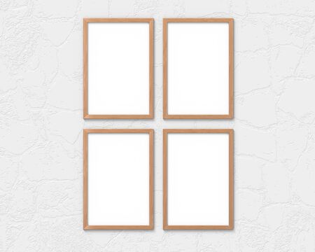 Set of 4 vertical wooden frames mockup with a border hanging on the wall. Empty base for picture or text. 3D rendering.の写真素材