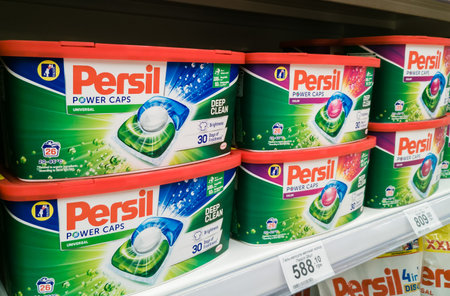 Zaporizhzhia, Ukraine - June 12, 2023: Persil Power Caps washing capsules on the supermarket shelfのeditorial素材