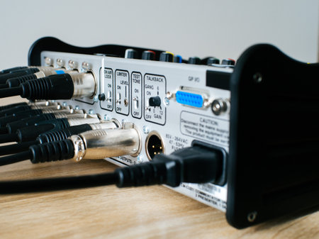 Back of mixing console with XLR cables connectedの写真素材
