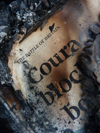 burnt newspaper courage wordの写真素材