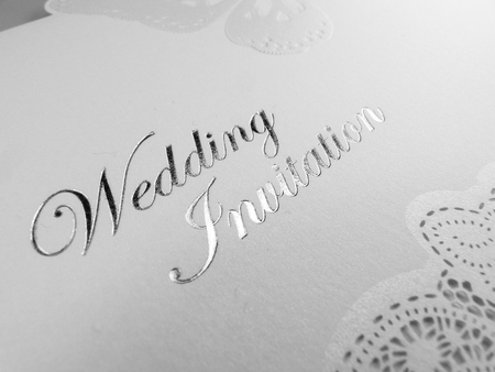 silver and white wedding invitationの写真素材