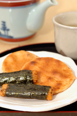 Tea with rice crackersの写真素材