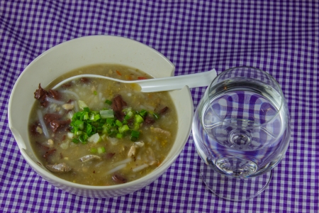 Rice Worm Soup ,  Kao Paick sen Traditional Thai style food  and glass for breakfastの写真素材