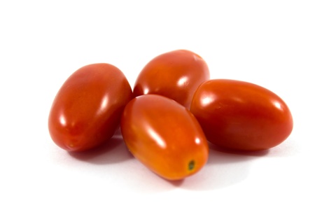Cherry tomato isolated on whiteの写真素材