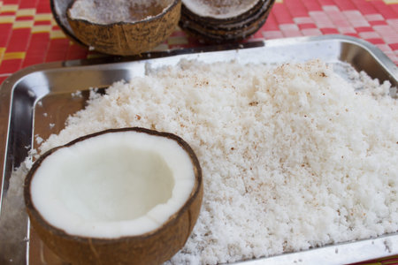 Sweetened flaked coconut ready to be used as a cooking or baking ingredient or as a garnish の写真素材