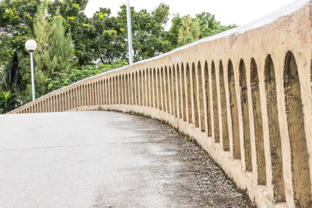 Bridge across the canal at gardenの写真素材