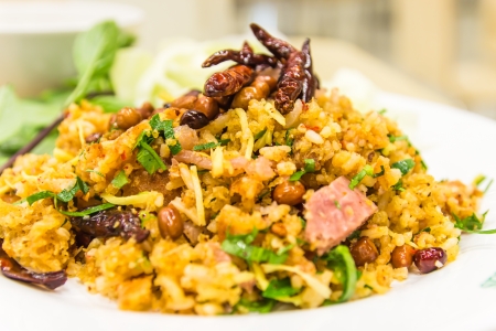 Spicy Salad of Curried Rice Croquettes, Fermented Pork, Ginger and Peanuts ,Yam Naem Khao Thot Thai nameの写真素材