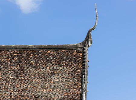 Gable apex of thai temple and blue skyの写真素材