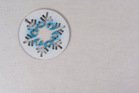 Background picture - symbolic snowflake on a white background.