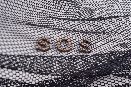 Abstract image of a person in trouble. SOSの写真素材