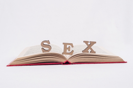 Word sex abstract letters, white background open bookの写真素材