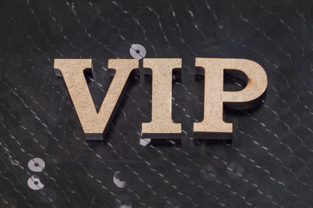 VIP is written in abstract letters. Black luxurious sparkling backgroundの写真素材